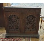 Eastern hardwood Anglo-Indian style cupboard, the rectangular top with applied egg and dart