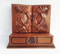 Carved wooden presentation stand with a carved open book, 38cm side x 30cm high