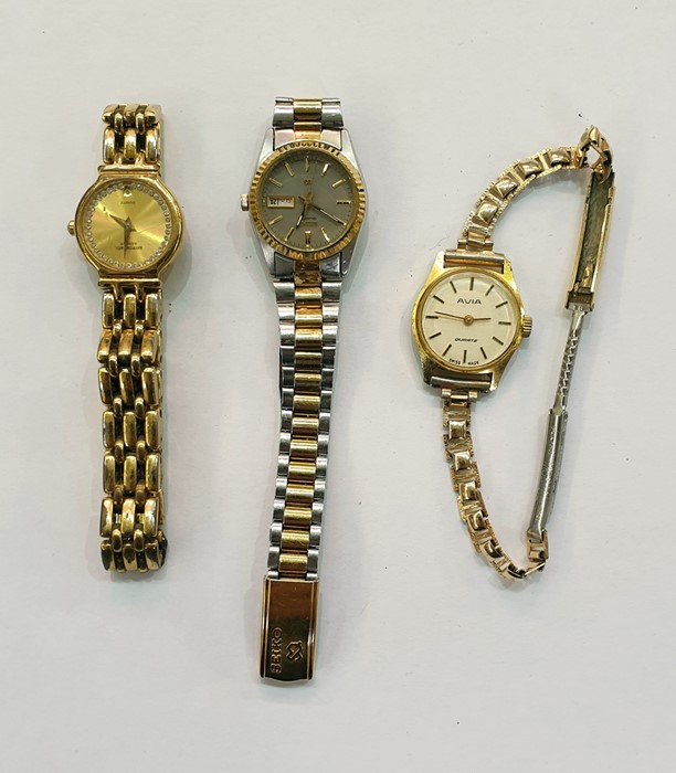 Lady's Seiko wristwatch with calendar aperture, a lady's Raymond Weil gilt watch with date