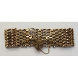 9ct gold seven-bar gate bracelet with padlock clasp, 16g approx Condition Reportthe length is approx