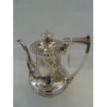 Silver coffee pot, with floral engraving, gadrooned border of semi-waisted form, to raised