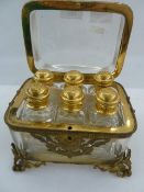 19th century French gilt and glass scent bottle casket, rectangular with rounded corners, fitted six