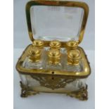 19th century French gilt and glass scent bottle casket, rectangular with rounded corners, fitted six
