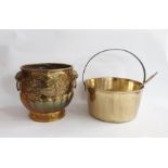 Copper and metal brass and metal large pan with a brass ladle and a brass coal bucket with