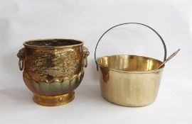 Copper and metal brass and metal large pan with a brass ladle and a brass coal bucket with