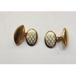 Pair 18ct gold and white enamel oval and marquise shaped cufflinks, each oval having latticework