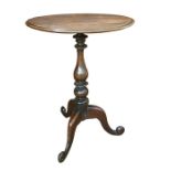 19th century walnut circular centre table with moulded edge, baluster turned supports to three