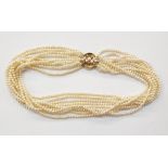Freshwater pearl nine strand 18ct gold pearl and diamond set choker necklace, the circular 18ct gold