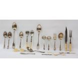 Assorted silver-plate and other flatware including salad servers, basting spoon, carving set,