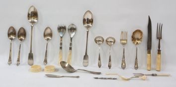 Assorted silver-plate and other flatware including salad servers, basting spoon, carving set,