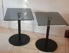 Pair contemporary smoked glass and metal pedestal occasional tables, the rectangular tops with