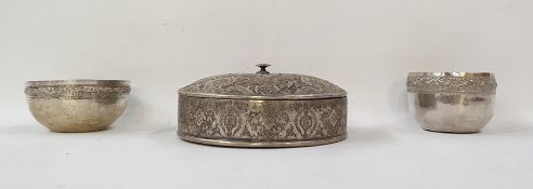 Iranian white metal covered box, circular, stylised floral and foliate chased and engraved and two