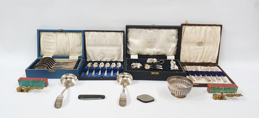 Silver-plated items including a cased condiment set, six cased soup spoons, two ladles, two