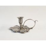 Georgian silver chamber taperstick with floral and foliate chasing within scrolls, scroll handle,