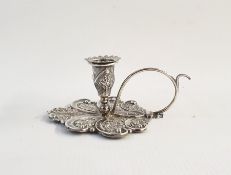 Georgian silver chamber taperstick with floral and foliate chasing within scrolls, scroll handle,