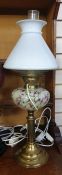 19th century oil lamp converted to electricity, with a mottled glass bowl and opaque conical