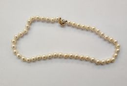 String of cultured pearls with 18ct white and yellow gold ball-pattern clasp, 46cm long