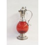 Victorian silver Gothic claret jug with fleur de lys engraving, scrolled handle and ruby ( not