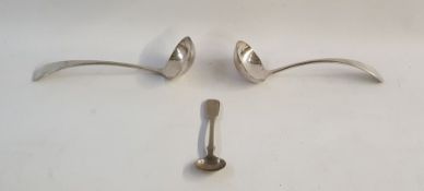 Two white metal sauce ladles and a silver fiddle pattern sugar spoon (3)