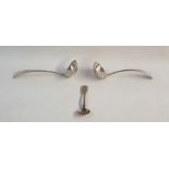 Two white metal sauce ladles and a silver fiddle pattern sugar spoon (3)