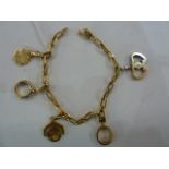 Cartier 18K charm bracelet hung with five detachable charms, 32.4g