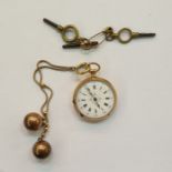 Lady's 18ct French gold open faced faced pocket watch, enamelled dial with roman numerals, Swiss