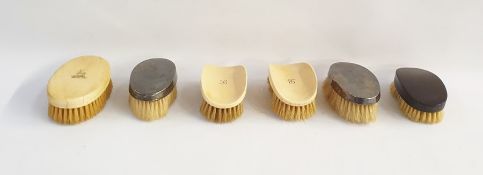 Assorted brushes to include two silver-backed examples (6)