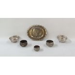 Three Eastern white metal small bowls, animal and scroll decorated, possibly Indian, two foreign