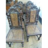 Set of six Carolean style oak dining chairs, each carved with fruiting vine, with caned back and