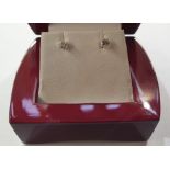 Pair of 18ct white gold solitaire diamond stud earrings, each approx 0.17ct