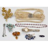 Quantity of costume jewellery including faux-pearls, beads, brooches, watch, earrings and assorted