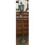 20th century brass standard lamp in the form of a Victorian street light, the six-glass shade on a
