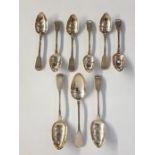 Six assorted Georgian silver fiddle pattern spoons and three assorted Georgian fiddle pattern