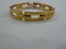 18K, possibly Cartier, gold bracelet, open rectangular links, indistinctly marked, 51g