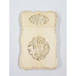 Late 19th/early 20th Chinese carved ivory card case with shaped oval reliefs of figures beside