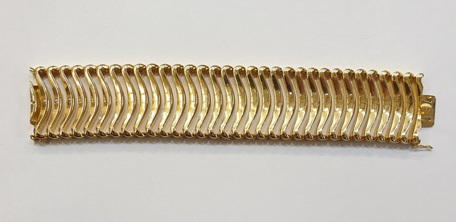 Continental gold-coloured metal cuff bracelet, having curved scroll links, 101.2g total approx