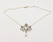 White metal, diamond and pearl Edwardian-style necklace, open scroll and ribbon design set with