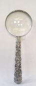 Burmese/Indian white metal handled magnifying glass, figure decorated