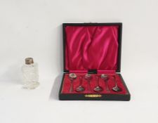 Set of six silver coffee spoons, Sheffield 1927, in fitted case and a cut glass dressing table