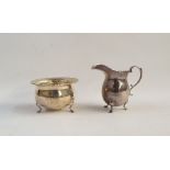 Silver sugar bowl and cream jug with wavy edge borders, raised on pad feet, Birmingham 1915,