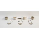 Assorted silver and white metal items to include two silver napkin rings, two white metal napkin