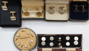 Boxed set of gold-coloured and mother-of-pearl dress studs in a fitted case, another set of