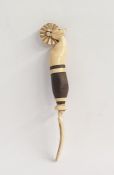 Carved bone and stained hardwood prisoner of war pastry jigger/fork decorated with a horse's head,