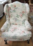20th century armchair by S Rouse & Co in the Georgian-manner, wingback with cream ground foliate