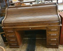 20th century tambour-fronted roll-top desk in oak, twin-pedestals, each of four drawers and