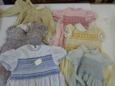 Child's smocked dresses - Heskia, Christian Handicraft Centre, Plum Blossom etc, (6)