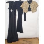 1970's halterneck black nylon jersey evening dress, the bodice gathered to a diamante and silver
