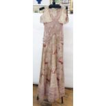 1930's net and watered silk lame dress with frilled hem in five tiers, diagonal design on the net