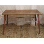 20th century rectangular coffee table with chrome slung paper rack under on circular section
