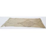 Early 20th century cream Assuit shawl with gold-coloured hammered metal design (one edge has been